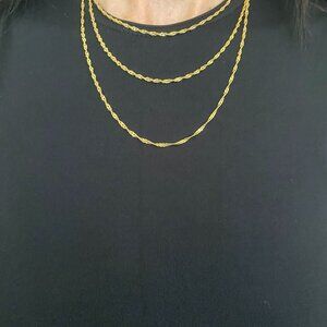 Three chain gold necklace